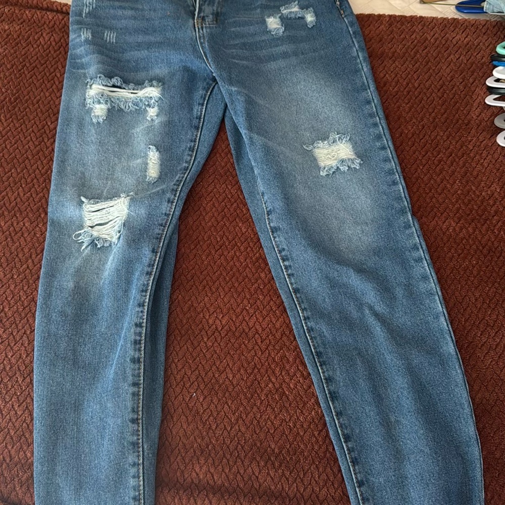 Distressed Blue Jeans